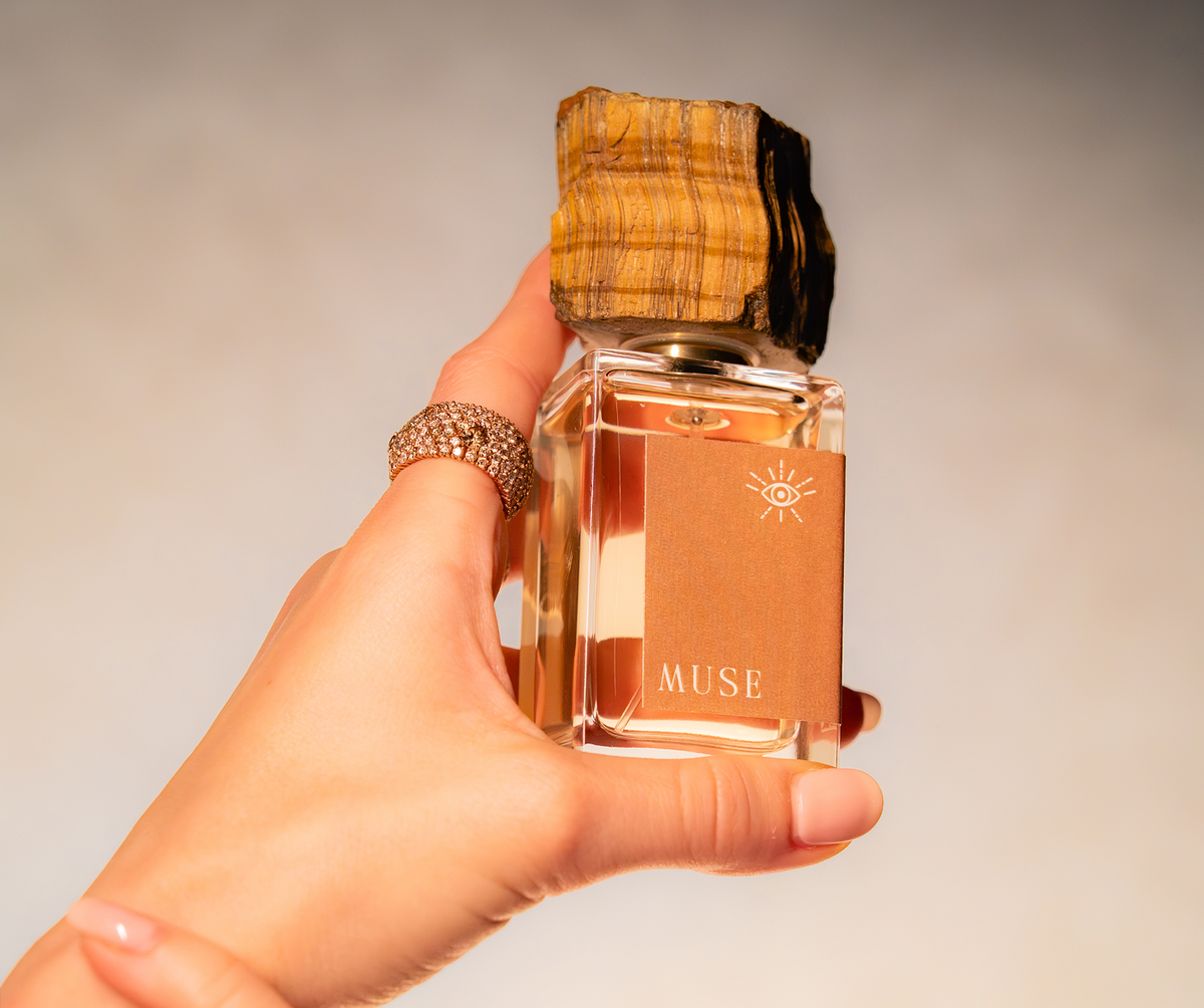 A unique cap, sculpted from genuine tiger's eye.
